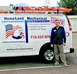Newly hired Refrigeration and HVAC Technician college graduate Brad Henry on-the-job with HomeLand Mechanical in Colorado Springs.