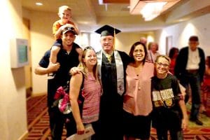 Brad Henry - HVAC and Refrigeration Technician program graduate of IntelliTec College in Colorado Springs - pictured with son-in-law Ryan Slusher, grandsons, daughter Stephanie, and wife Denise.